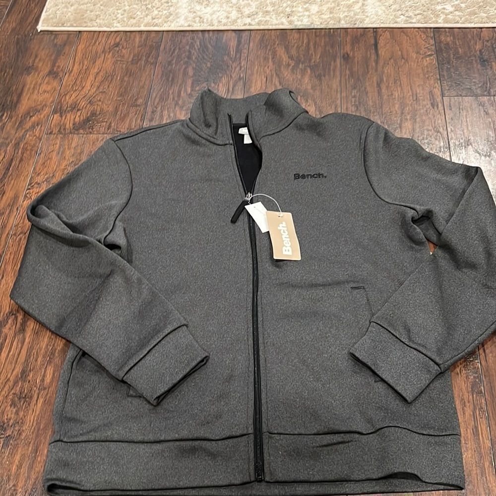 Bench,‎ men's zip up jacket. Gray and black size Large NWT athletic running